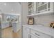 Bright kitchen with white cabinets, modern countertops, open shelving and a full stainless appliance package at 753 Enchantment Loop, Myrtle Beach, SC 29588