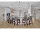 Spacious kitchen with a large island, stainless steel appliances, and hardwood floors at 753 Enchantment Loop, Myrtle Beach, SC 29588