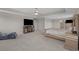 Main bedroom boasts carpet floors, sitting area with fireplace, ceiling fan, and a walk-in closet at 753 Enchantment Loop, Myrtle Beach, SC 29588