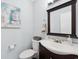Charming bathroom featuring a vanity with dark wood cabinets and neutral wall color at 800 9Th Ave. S # E-4, North Myrtle Beach, SC 29582