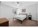 Bright bedroom with a ceiling fan, a window with blinds, and a neutral color scheme at 800 9Th Ave. S # E-4, North Myrtle Beach, SC 29582