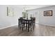 Dining area with a new floor and an adjacent view of the backyard at 800 9Th Ave. S # E-4, North Myrtle Beach, SC 29582