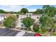 Inviting exterior view of home with mature trees, an American flag and private parking at 800 9Th Ave. S # E-4, North Myrtle Beach, SC 29582
