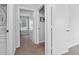 Hallway with doors, carpet flooring, and neutral-colored walls at 800 9Th Ave. S # E-4, North Myrtle Beach, SC 29582