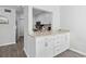 Bright kitchen featuring white cabinets, modern countertops, and stainless steel appliances at 800 9Th Ave. S # E-4, North Myrtle Beach, SC 29582