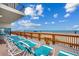 View from oceanfront deck with lounge chairs overlooking beach and ocean at 912 N Waccamaw Dr. # 904, Garden City Beach, SC 29576