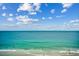 Enjoy the turquoise hues of the ocean from this high-rise vantage point; a jet ski adds a touch of adventure at 912 N Waccamaw Dr. # 904, Garden City Beach, SC 29576