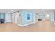 A bright hallway with elevators, seating area, and decoratively painted walls at 9820 Queensway Blvd. # 502, Myrtle Beach, SC 29572