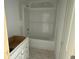 Bathroom featuring a white tub and shower combo next to a new vanity cabinet awaiting installation at 1021 Jase Dr., Longs, SC 29568