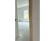 Bright bedroom featuring a large window overlooking the backyard, new construction at 1021 Jase Dr., Longs, SC 29568