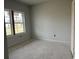 Bright room with window, showing the home's potential and clean interior ready for personalization at 1021 Jase Dr., Longs, SC 29568