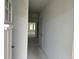 Bright entryway with white walls and trim, showcasing the home's open floor plan at 1021 Jase Dr., Longs, SC 29568