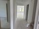 Spacious hallway offering a glimpse into the well-lit interior and stairs, highlighting the home's layout at 1021 Jase Dr., Longs, SC 29568