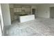 Open-concept living and kitchen area with natural light, awaiting final touches, new construction at 1021 Jase Dr., Longs, SC 29568