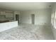 Spacious open-concept kitchen and living area, awaiting finishing touches, new construction at 1021 Jase Dr., Longs, SC 29568