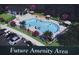 Future amenity area featuring a pool with lounge chairs, umbrellas and a pool house at 1021 Jase Dr., Longs, SC 29568