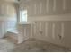 Bathroom awaiting finishing with bathtub and a bright window at 1045 Jase Dr., Longs, SC 29568