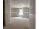 Bright bedroom with a window offering natural light, ready for personalization and decor at 1045 Jase Dr., Longs, SC 29568