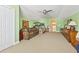 Spacious bedroom featuring a bunk bed, comfortable seating, and neutral carpeting at 106 Cypress Creek Dr., Murrells Inlet, SC 29576