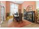 Dining room with wood-look flooring, statement chandelier, black china cabinet, and seating for four at 106 Cypress Creek Dr., Murrells Inlet, SC 29576