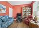 Inviting home office with a comfortable reading chair and well-stocked bookshelf at 106 Cypress Creek Dr., Murrells Inlet, SC 29576