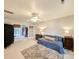 Bedroom featuring a ceiling fan, neutral walls and carpet, as well as a blue comforter at 1073 Crooked Oak Dr., Pawleys Island, SC 29585