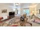 Inviting living room showcasing hardwood floors, a cozy couch, and stylish decor at 1073 Crooked Oak Dr., Pawleys Island, SC 29585