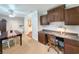 Study area that includes a desk, cabinets and a view of the dining room at 1073 Crooked Oak Dr., Pawleys Island, SC 29585
