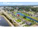 Stunning aerial view of a home with community lake and distant ocean at 1149 6Th Ave. S, North Myrtle Beach, SC 29582