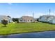 Expansive backyard with lush lawn extending to the waterfront, providing a serene outdoor space at 1149 6Th Ave. S, North Myrtle Beach, SC 29582
