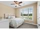 Guest bedroom with ceiling fan, window, and carpeted floor at 1149 6Th Ave. S, North Myrtle Beach, SC 29582
