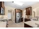 Efficient kitchen with stainless steel appliances and ample counter space, ideal for meal preparation at 1149 6Th Ave. S, North Myrtle Beach, SC 29582