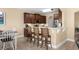 Well-equipped kitchen with stainless steel appliances, breakfast bar seating, and sleek countertops at 1149 6Th Ave. S, North Myrtle Beach, SC 29582
