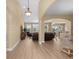 Bright living room with open floor plan, archways, light hardwood floors and elegant furnishings at 1149 6Th Ave. S, North Myrtle Beach, SC 29582