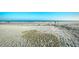 Picturesque beach scene with sand and surf under a clear blue sky at 1207 S Ocean Blvd. # 50809, Myrtle Beach, SC 29577
