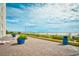 Walkway to the beach with lounge chairs and lush greenery, promising an outdoor oasis at 1207 S Ocean Blvd. # 50809, Myrtle Beach, SC 29577