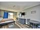 Condo bedroom featuring a queen bed, dresser, and balcony access at 1207 S Ocean Blvd. # 50809, Myrtle Beach, SC 29577