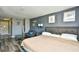 Comfortable condo bedroom with bed, sofa, and decor at 1207 S Ocean Blvd. # 50809, Myrtle Beach, SC 29577