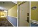 Hallway view with unit number 50809 on the white unit door at 1207 S Ocean Blvd. # 50809, Myrtle Beach, SC 29577
