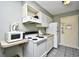 Convenient kitchenette complete with microwave, oven, and refrigerator at 1207 S Ocean Blvd. # 50809, Myrtle Beach, SC 29577