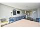 Comfortable condo living room with dining area and kitchenette at 1207 S Ocean Blvd. # 50809, Myrtle Beach, SC 29577