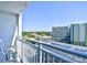 Balcony with seating offers a view of the surrounding buildings and landscape at 1207 S Ocean Blvd. # 51012, Myrtle Beach, SC 29577