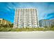 Exterior of a high-rise condo building with balconies, overlooking the beach and ocean at 1207 S Ocean Blvd. # 51012, Myrtle Beach, SC 29577
