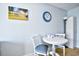 Cozy dining area with white table, blue accents, and beach-themed decor offers a relaxing space at 1207 S Ocean Blvd. # 51012, Myrtle Beach, SC 29577