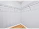 Empty closet featuring an organized wire shelving system and light wood-look flooring at 1208 River Oaks Dr. # 24-B, Myrtle Beach, SC 29579