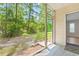 Screened in patio with view of the trees and greenery at 1208 River Oaks Dr. # 24-B, Myrtle Beach, SC 29579