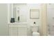 Bathroom showcases a vanity, minimalist art, and a shower with a curtain at 1222 Willow Oaks Way, Conway, SC 29526