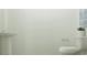 Well-lit bathroom features a pedestal sink and a modern toilet at 1222 Willow Oaks Way, Conway, SC 29526