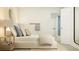 Stylish bedroom features a bed, neutral decor, and an open doorway at 1222 Willow Oaks Way, Conway, SC 29526