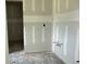 Image of an unfinished hallway looking into a future space at 1236 Mill Banks Dr., Longs, SC 29568